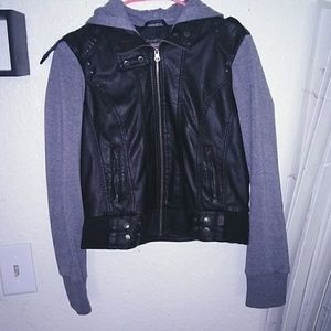 Leather jacket with material sleeves